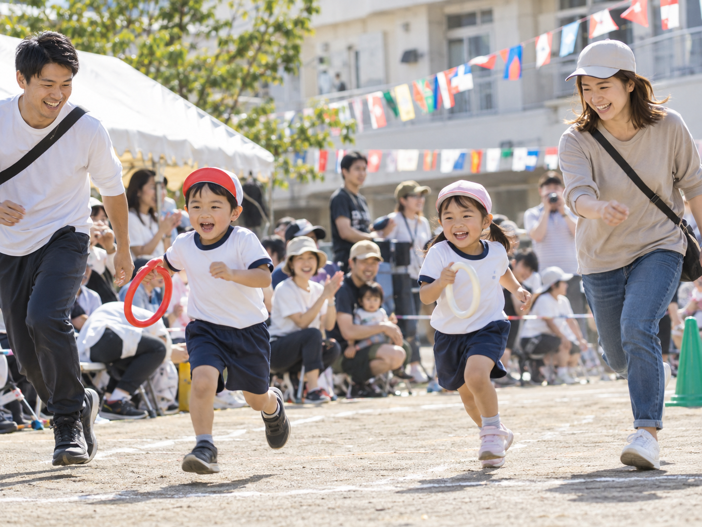 Children and families enjoying group activities at a Japanese nursery school sports day.